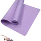 FitGearly non-slip Pilates exercise mat laid out on a wooden floor, showing textured surface for stability during workouts.