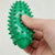 FitGearly spiky foot massage and yoga workout ball, used for foot therapy and fitness exercises, with textured surface for stimulation.