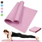 FitGearly non-slip Pilates fitness exercise mat laid out on a wooden floor, showcasing its textured surface and thickness.