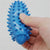 FitGearly spiky foot massage and yoga workout ball for foot relief and exercise, shown on a clean surface.